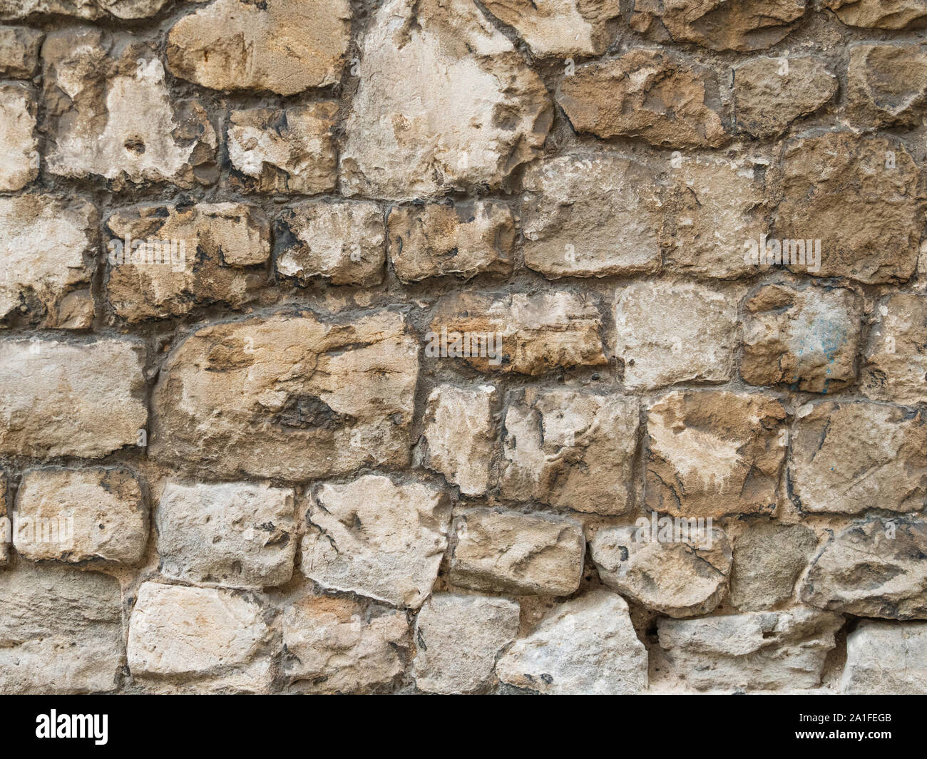 Natural rough stone wall - texture. Stock Photo