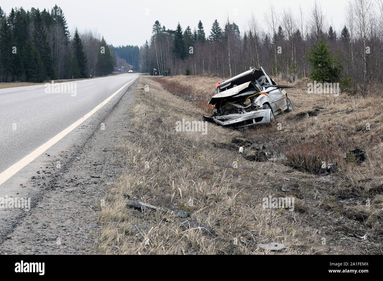 Car after bad accident. Total damaged car in roadside. Copy space Stock Photo
