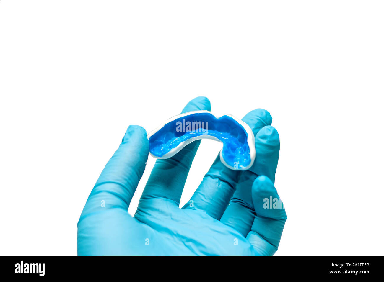 A white custom mouthguard for 6 old kid Stock Photo