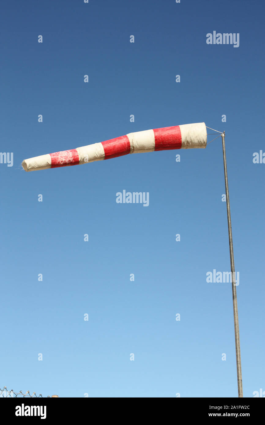 Windsock. Instrument for measuring wind speed and direction Stock Photo