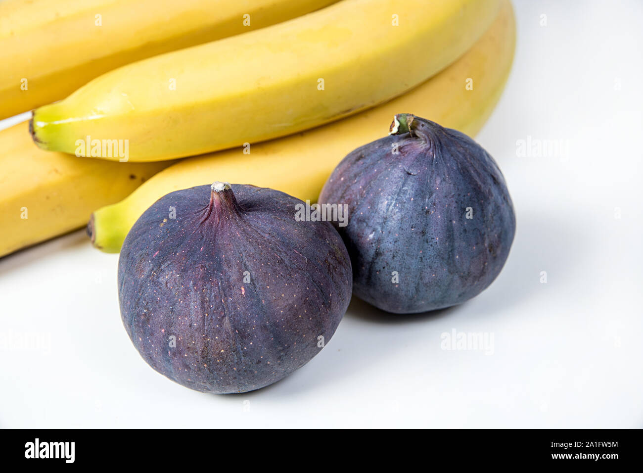figs and bananas, beautiful fruits, bananas, purple figs, close-up, vitamins concept, vegan food, healthy eating, Stock Photo