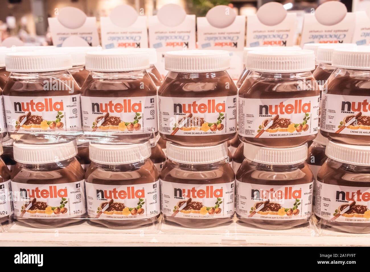 Nutella jars displayed on a market shelf. Stock Photo