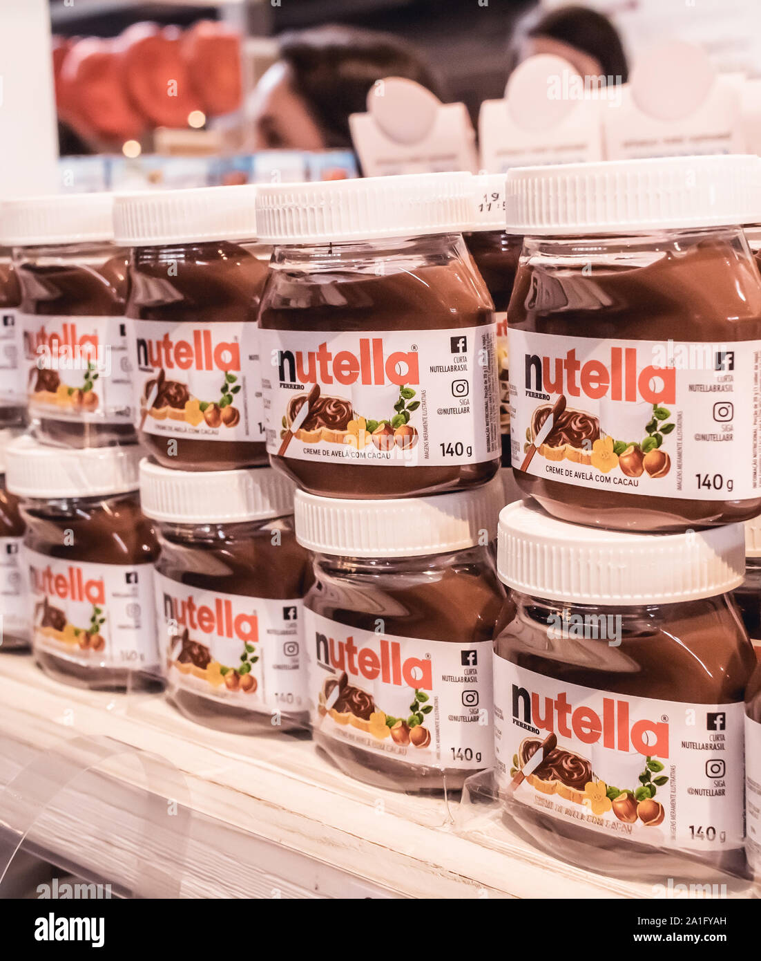 Nutella jars displayed on a market shelf. Stock Photo