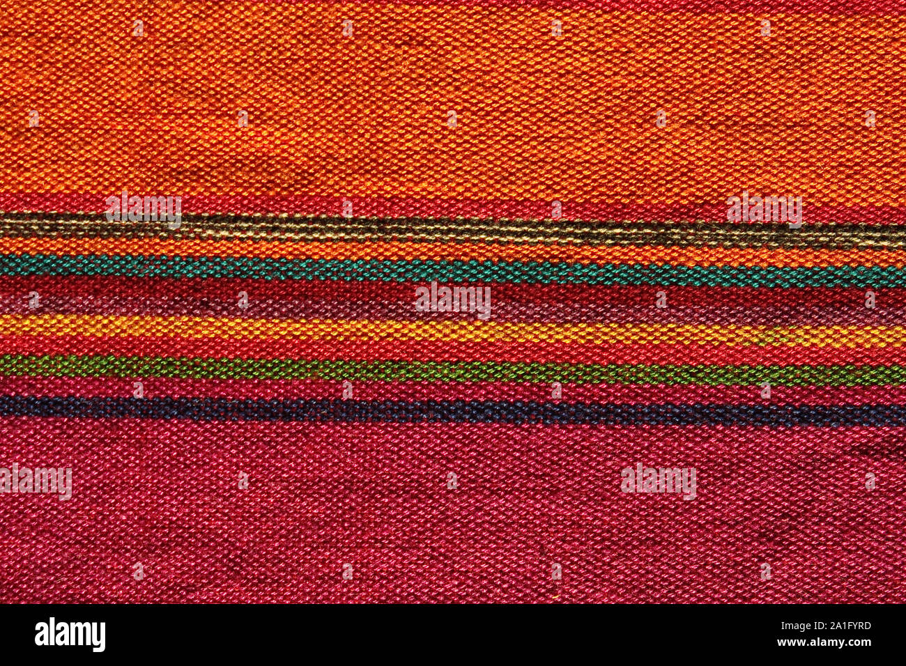 Oriental Rug (India) with floral motifs and colors (Orange, green, red, blue)... colorful Indian textile. Stock Photo