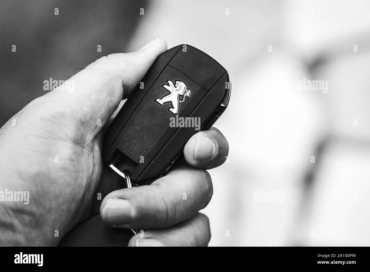 Photo of a car key with Peugeot brand symbol Stock Photo - Alamy
