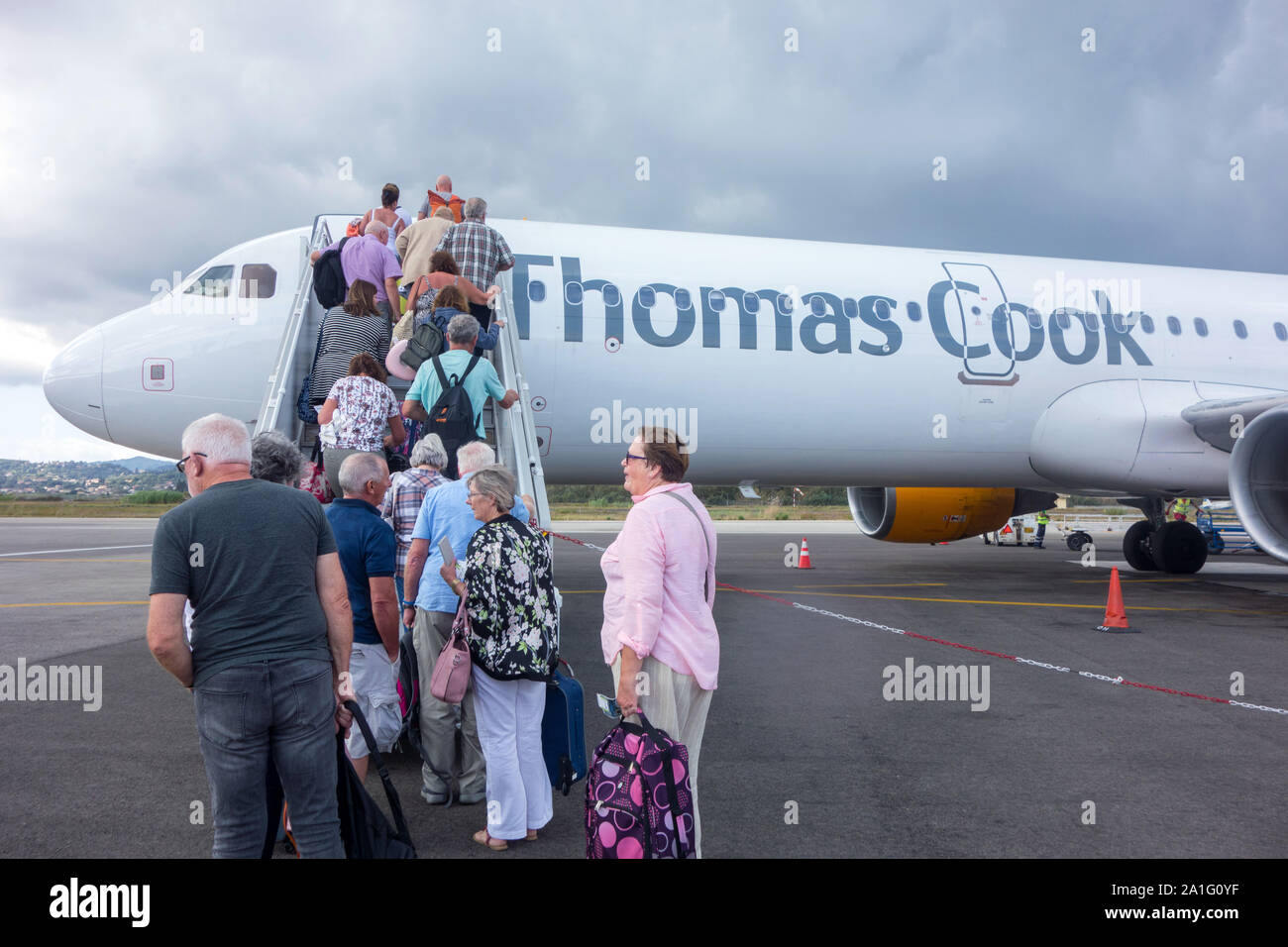 Passengers  boarding  Thomas Cook plane for England in Corfu being operated by avion express on behalf of ATOL after the collapse of the travel agent Stock Photo