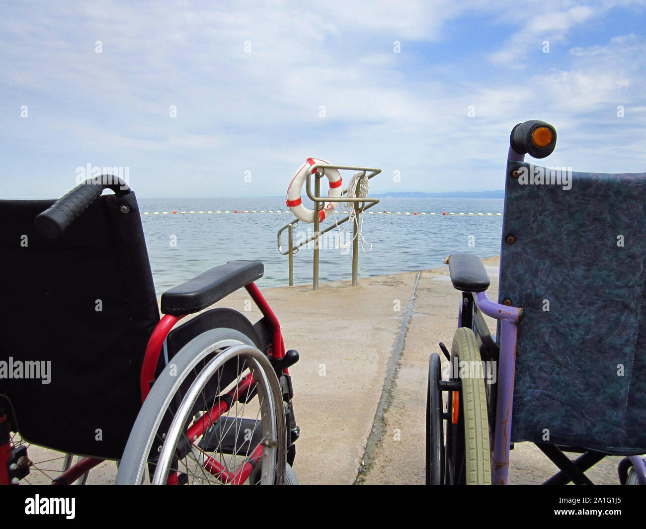 Wheelchairs on an accessible beach for transportation of people with disabilities in the water