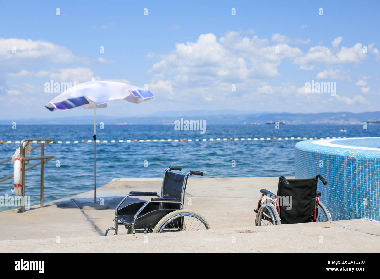 Wheelchairs on an accessible beach for transportation of people with disabilities in the water