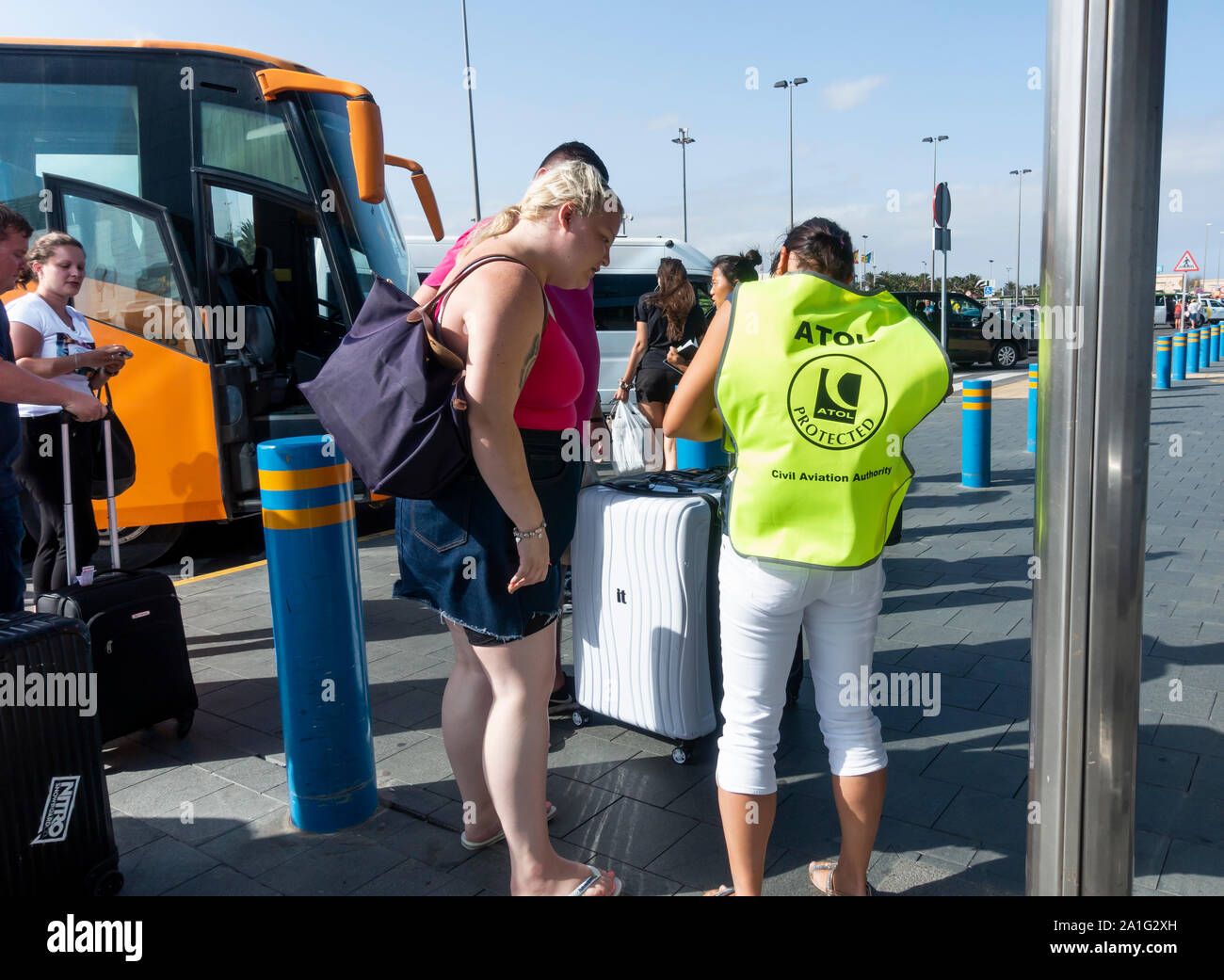 Gran Canaria, Canary Islands, Spain. 26th September, 2019. Thomas Cook customers arrive at Gran Canaria airport, where four repatriation flights to the UK are scheduled for Thursday night (26th September). Atol staff and British Government officials where at the airport to assist passengers.  Repatriation flights from The Canary Islands will continue into October. Credit: Alan Dawson News/Alamy Live News Stock Photo