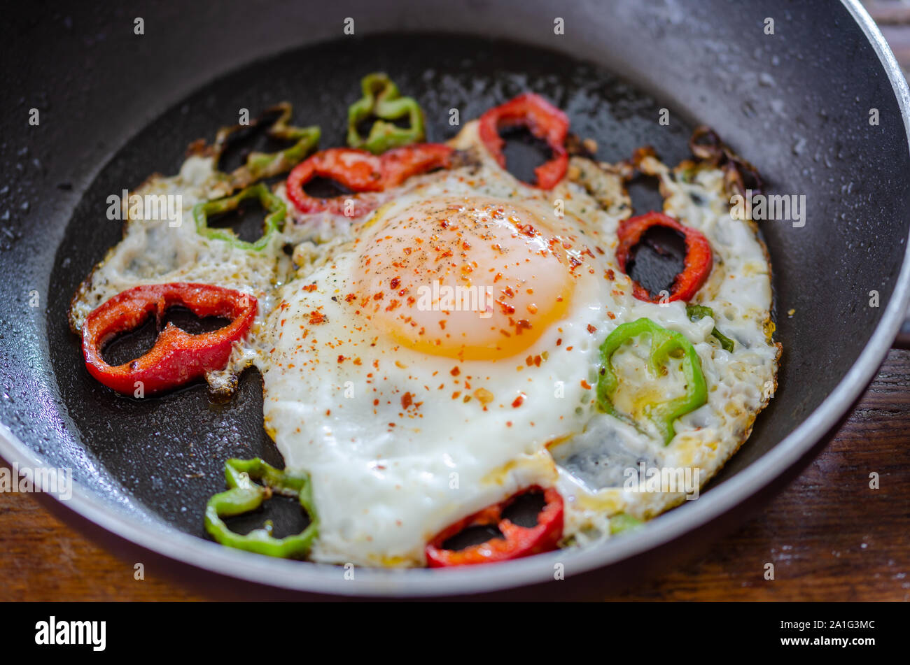 Fried egg in pan Stock Photo