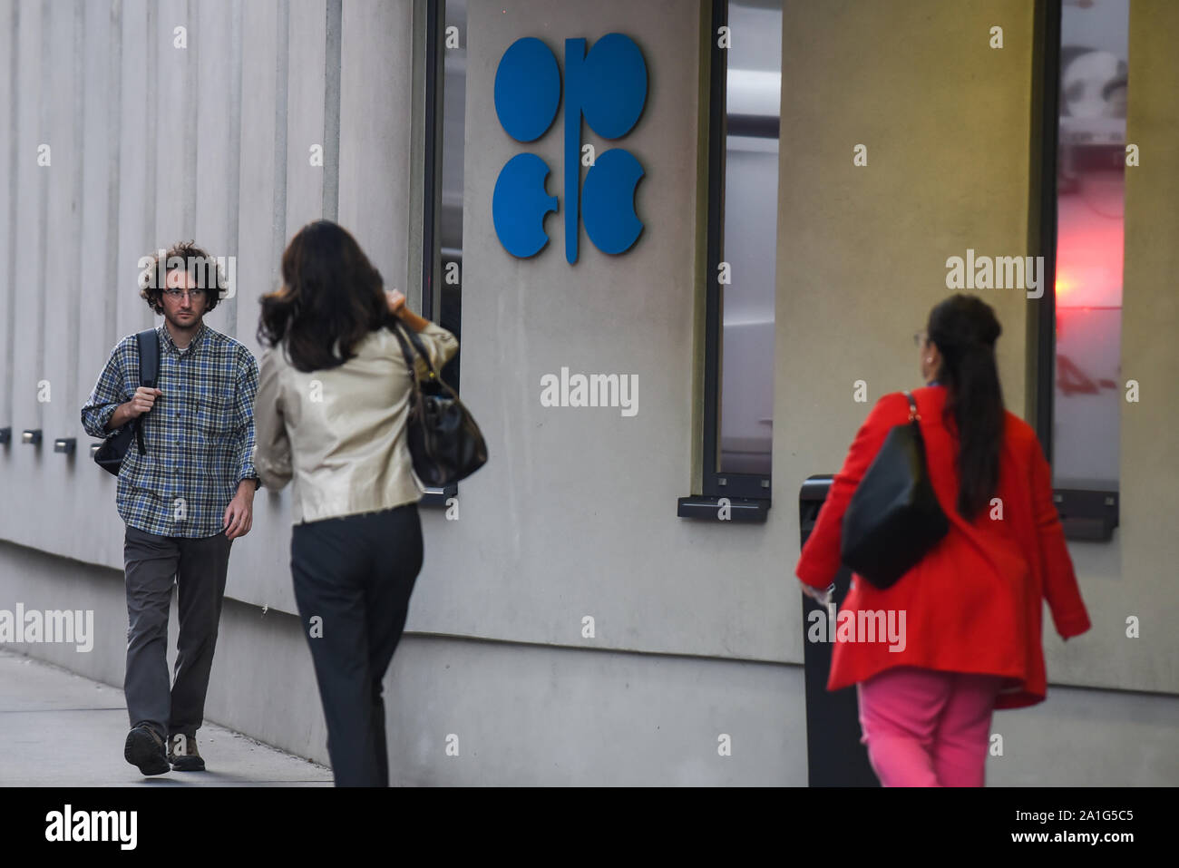 Vienna, Austria. 26th Sep, 2019. People walk by the entrance of the Organization of the Petroleum Exporting Countries (OPEC) headquarters. Credit: Omar Marques/SOPA Images/ZUMA Wire/Alamy Live News Stock Photo