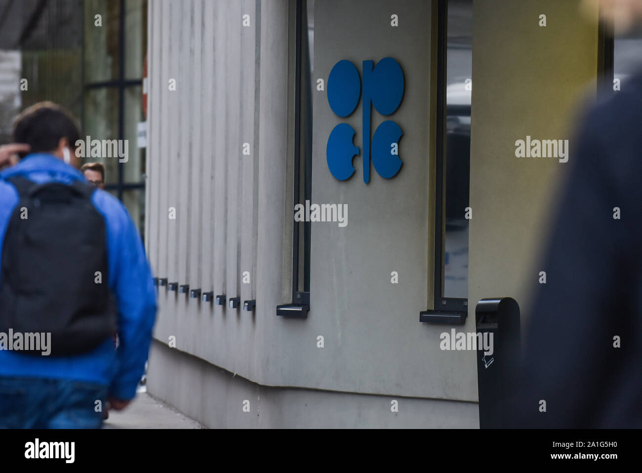 Vienna, Austria. 26th Sep, 2019. People walk by the entrance of the Organization of the Petroleum Exporting Countries (OPEC) headquarters. Credit: Omar Marques/SOPA Images/ZUMA Wire/Alamy Live News Stock Photo
