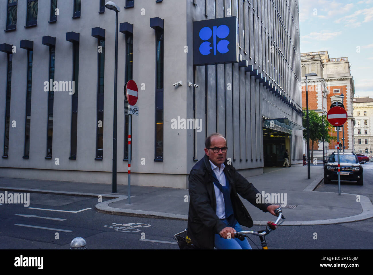 Vienna, Austria. 26th Sep, 2019. A man rides a bicycle by the entrance of the Organization of the Petroleum Exporting Countries (OPEC) headquarters. Credit: Omar Marques/SOPA Images/ZUMA Wire/Alamy Live News Stock Photo