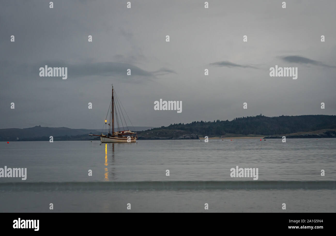 Wooden yacht moored in calm bay Stock Photo - Alamy