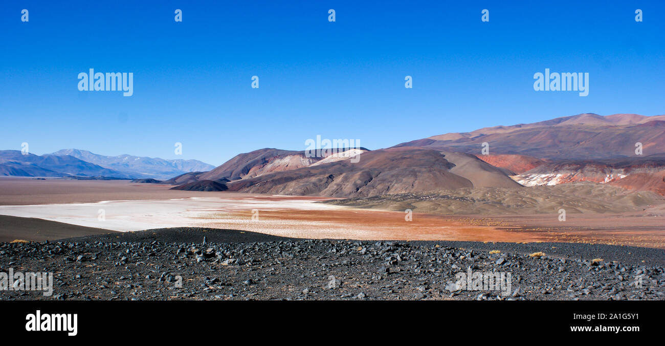 a view of the valley, the river and the rainbow mountain of 7 colors, Jujuy, Argentina, Atacama Chile Stock Photo