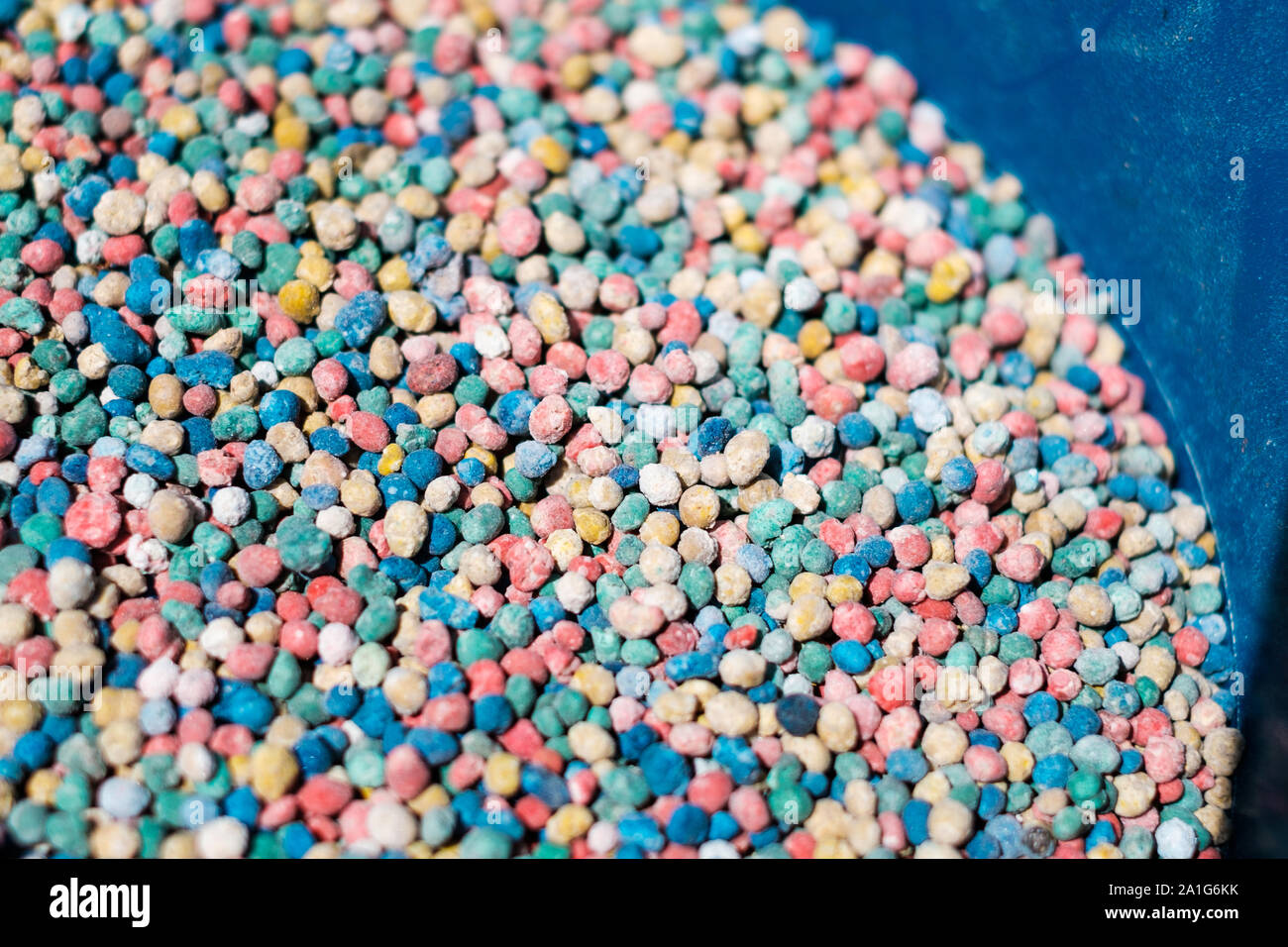 chemical felrtilizer closeup - colorful fertilizer granules - Stock Photo