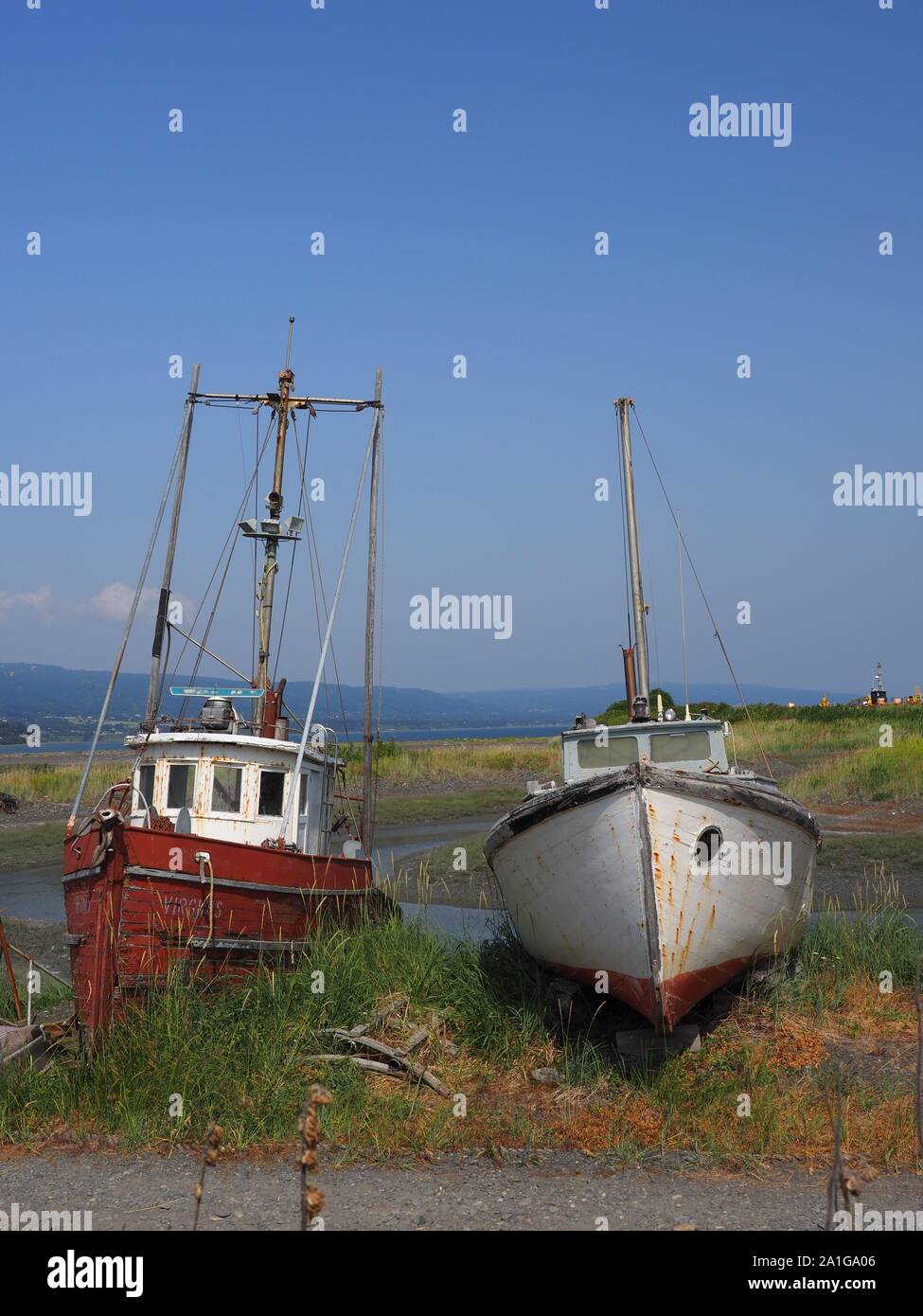 two beached derelict wrecked boats Homer Alaska USA Stock Photo Alamy