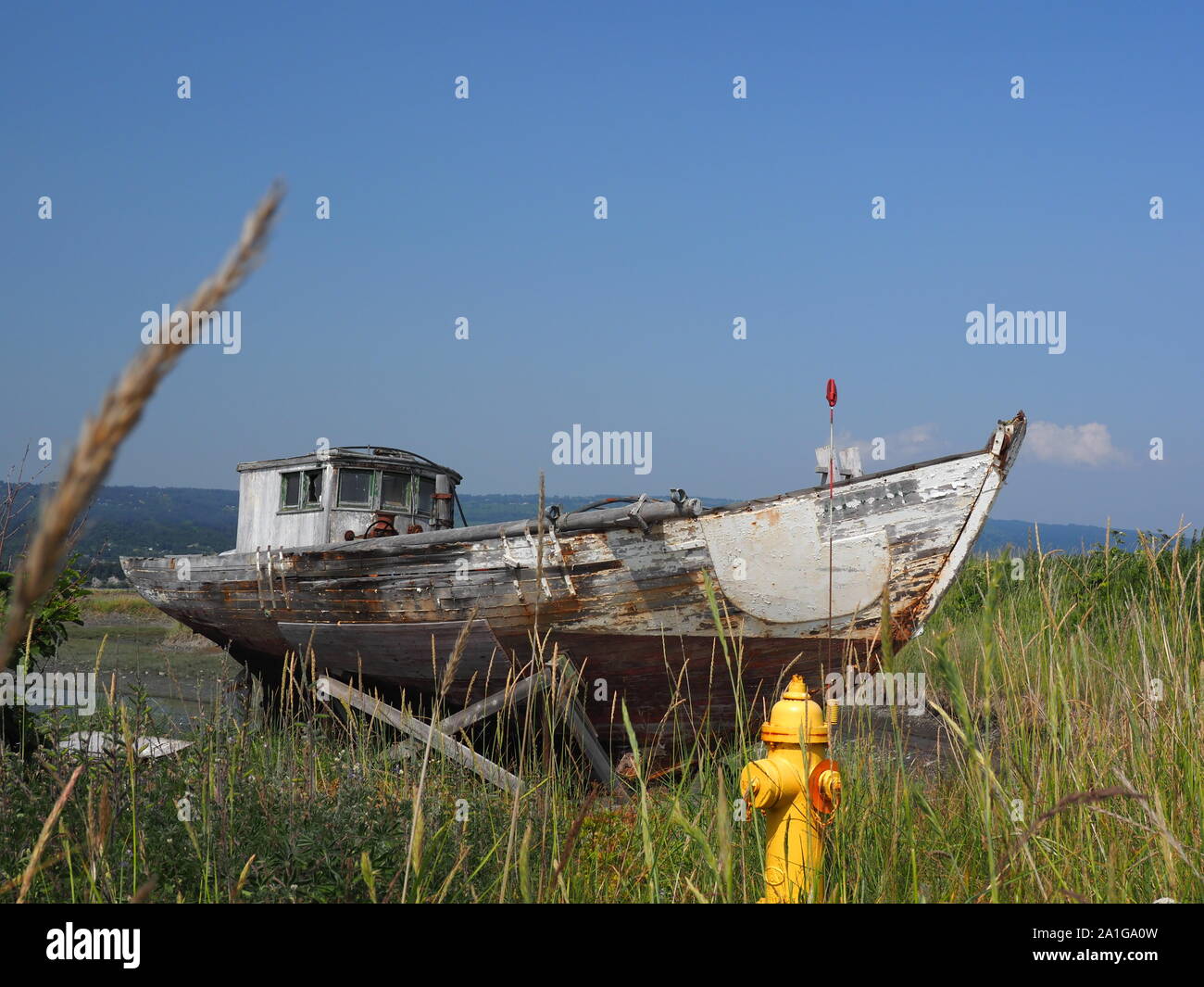 Beached Abandoned derelict wrecked Boat Homer Alaska America Stock Photo