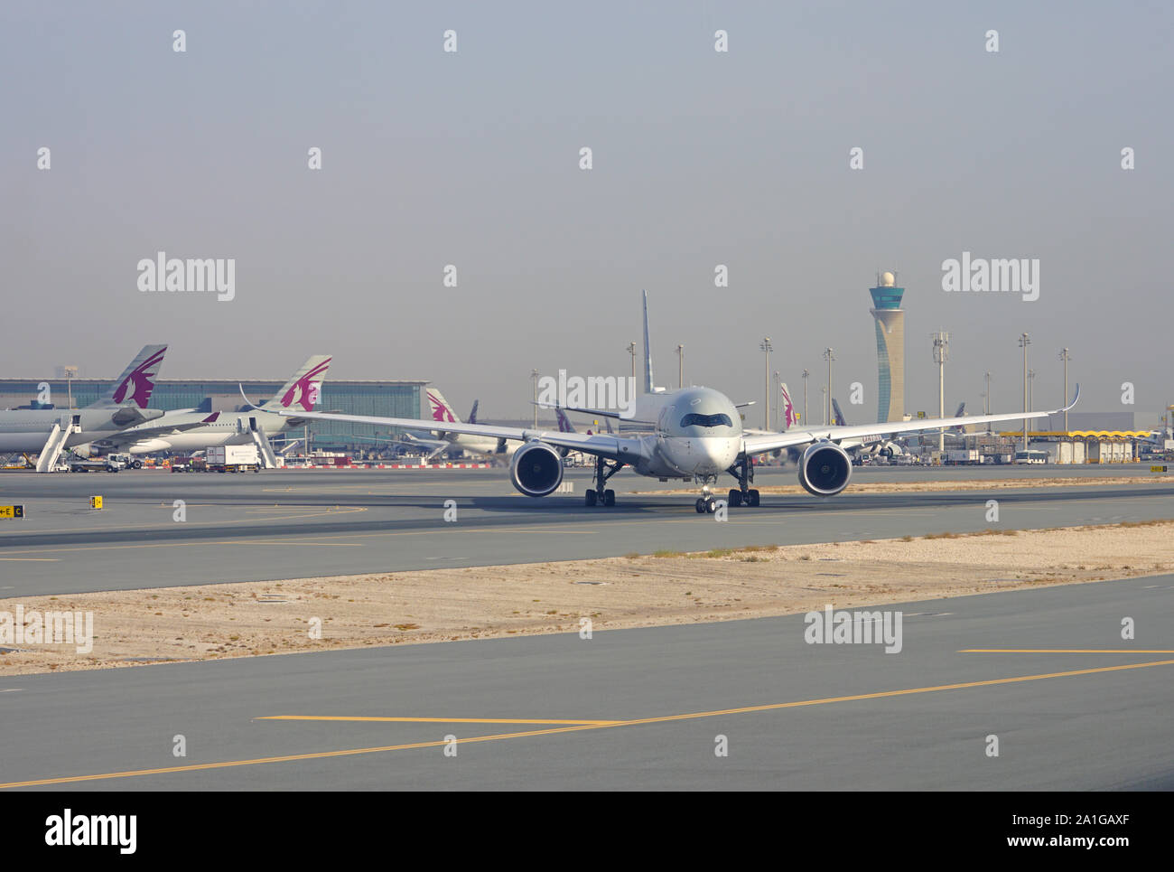DOHA, QATAR -17 JUN 2019- View of airplanes from Qatar Airways (QR) at ...