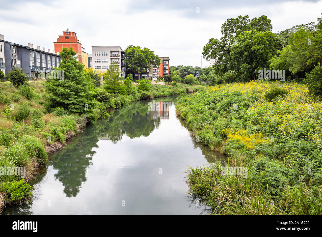 San Antonio Riverwalk is a popular travel destination with outdoor cafes and lush gardens along San Antonio River Stock Photo