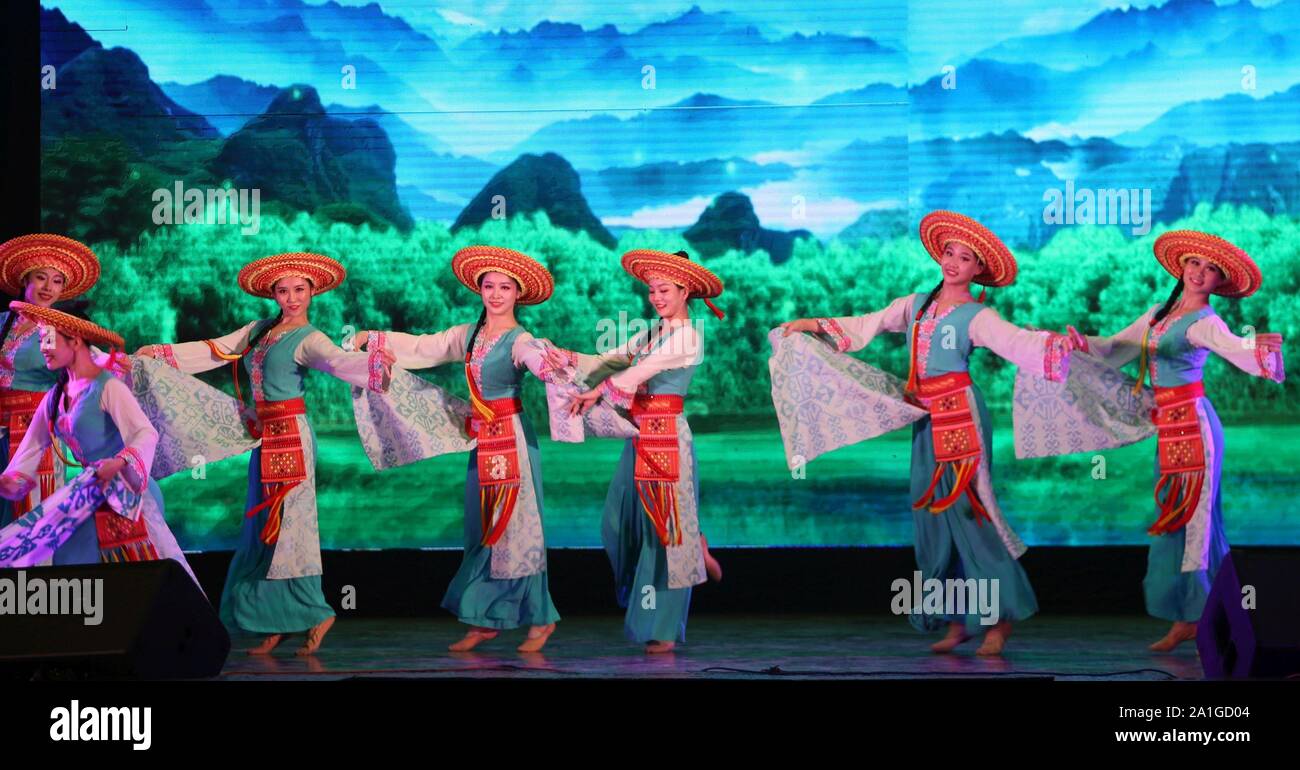 Kathmandu, Nepal. 26th Sep, 2019. Artists perform group dance during 'Splendid Hunan', a cultural performance organized on occasion of the 70th Anniversary of the founding of People's Republic of China in Kathmandu, Nepal Artists Hunan province perform China's ethnic group dances, acrobatics, songs, mask dance and puppet show in the event organized by China Cultural Center in Nepal and Hunan Provincial Department of Culture and Tourism to promote China's culture to Nepalese people. (Photo by Archana Shrestha/Pacific Press) Credit: Pacific Press Agency/Alamy Live News Stock Photo