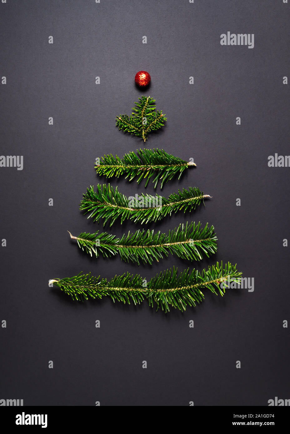 Christmas Greeting Card. Stylized Christmas tree on a black background Stock Photo