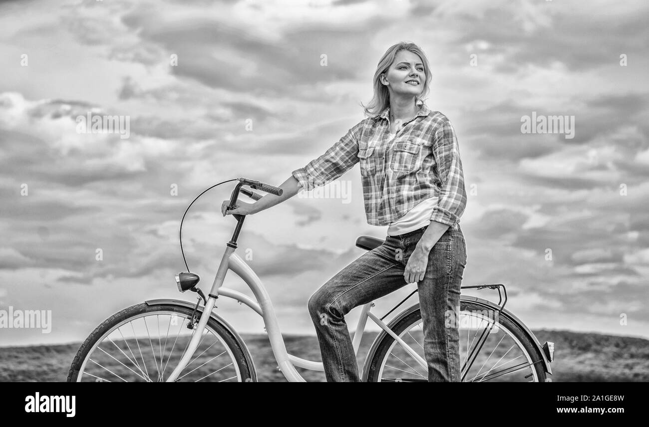 Woman Riding Cruiser Active leisure and healthy activity. Girl ride cruiser model bicycle ...
