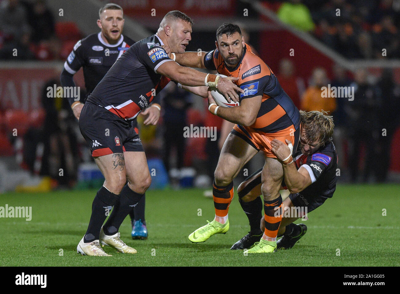 26th September 2019 ,  AJ Bell Stadium, Salford, England;  Betfred Super League Rugby, Round Eliminator 2, Salford Red Devils vs Castleford Tigers ; Castleford Tigers Matt Cook finds no way past the Salford Red Devils defence. Credit: Dean Williams/News Images Stock Photo