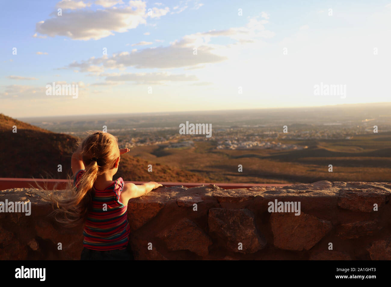 Child overlooking El Paso at sunset Stock Photo