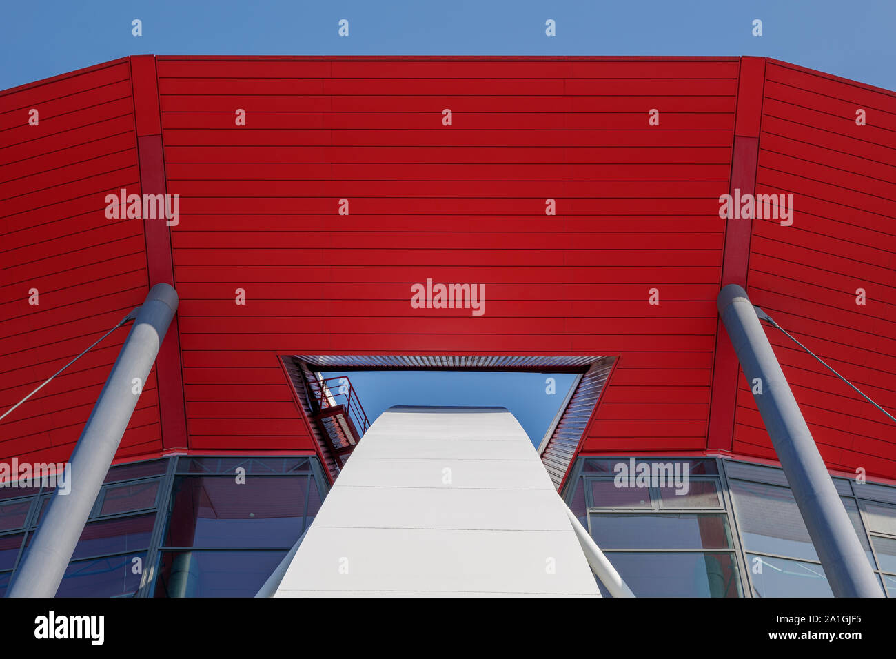 Close up detail view of white arch steel beam structure through the