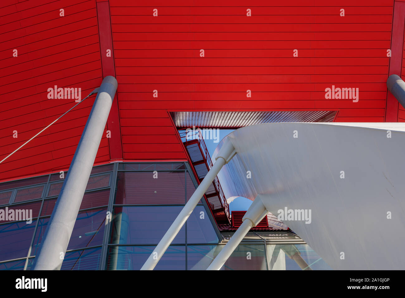 Close up detail view of white arch steel beam structure through the