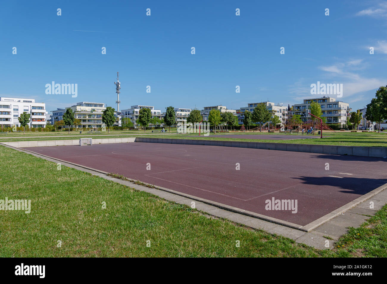 Football, soccer or futsal court field  at Bürgerpark Kalk, public park surrounded with housing and residence. Stock Photo