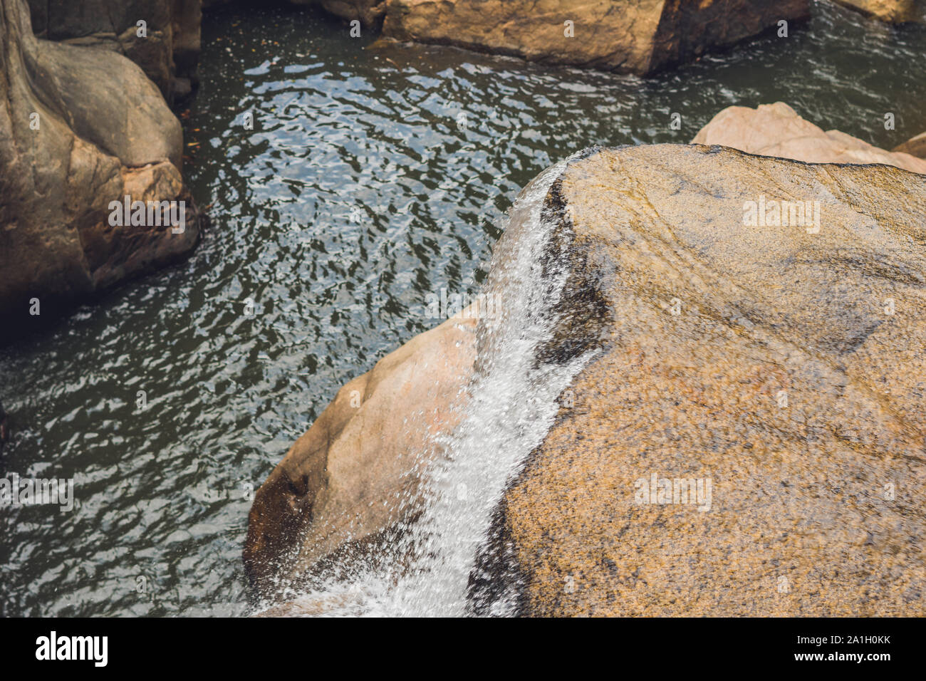 Turquoise water of the mountain river Ganges among white smooth stones. Gangotri. Uttarkashi district. Stock Photo
