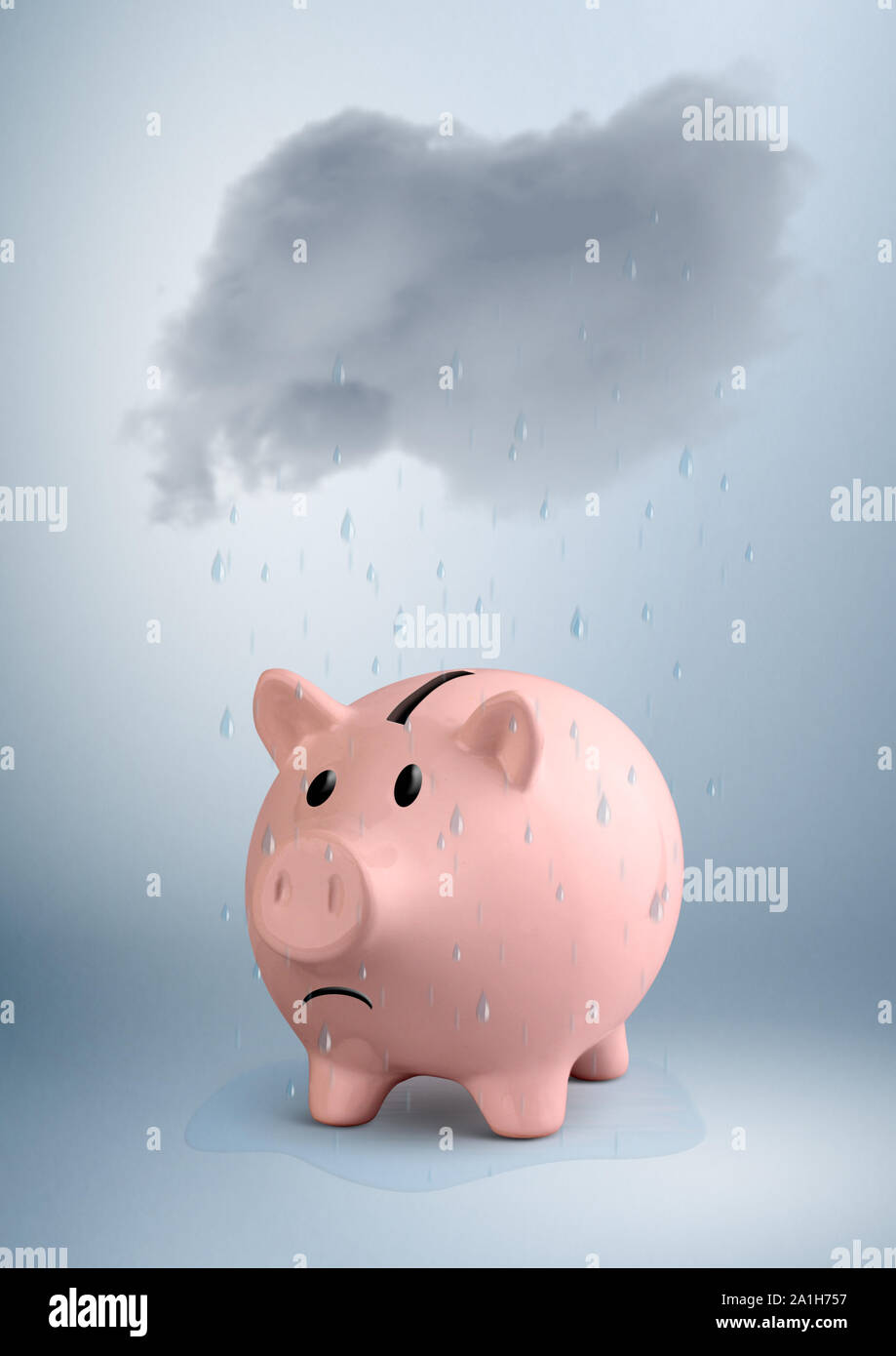 savings at risk concept, piggy bank and rain Stock Photo