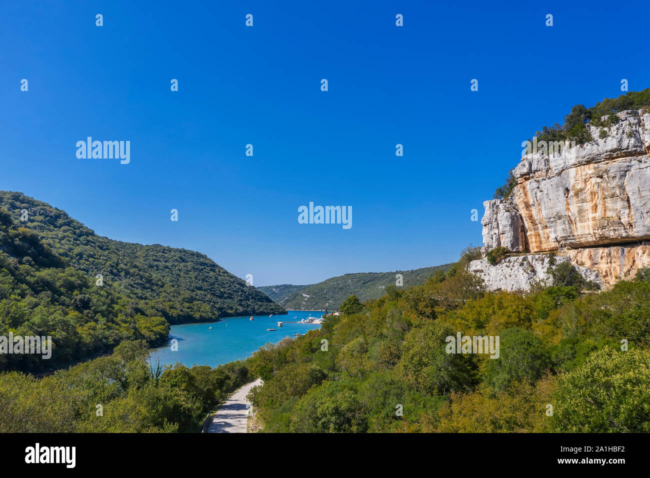 An aerial view of Limski Kanal with vertical rock mountain Stock Photo