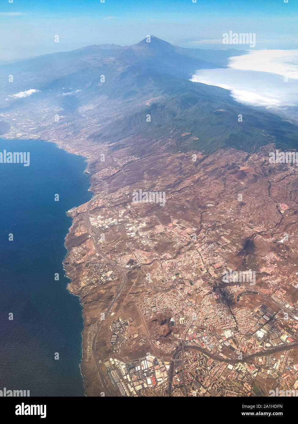 Aerial shot of Tenerife Island from coast to mountain peak Stock Photo