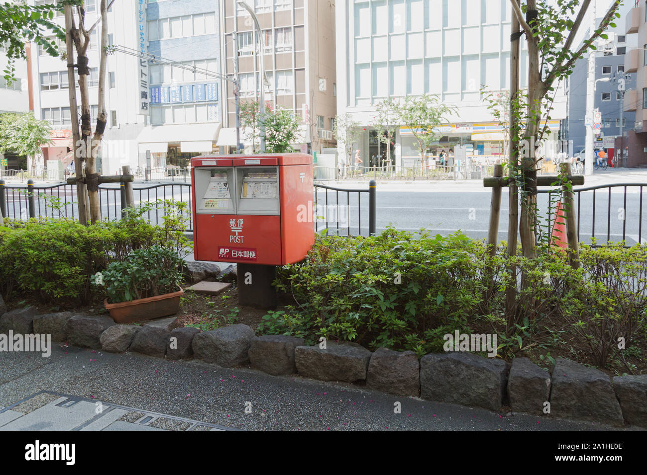 A typical Japanese post box in the landscaped sidewalk in Asakusa, Tokyo, Japan. Stock Photo