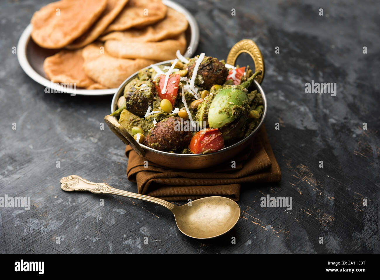 Undhiyu is a Gujarati mixed vegetable dish, specialty of Surat, India