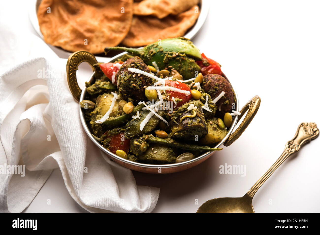 Undhiyu is a Gujarati mixed vegetable dish, specialty of Surat, India