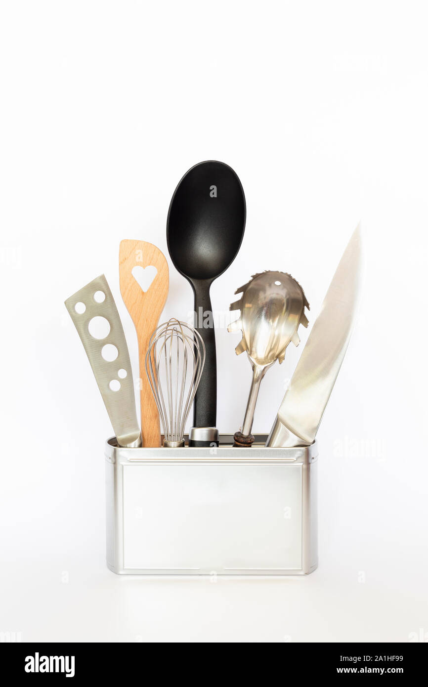 https://c8.alamy.com/comp/2A1HF99/assortment-of-kitchenware-and-cooking-tools-in-a-square-silver-colored-metal-box-with-copy-space-on-white-background-2A1HF99.jpg
