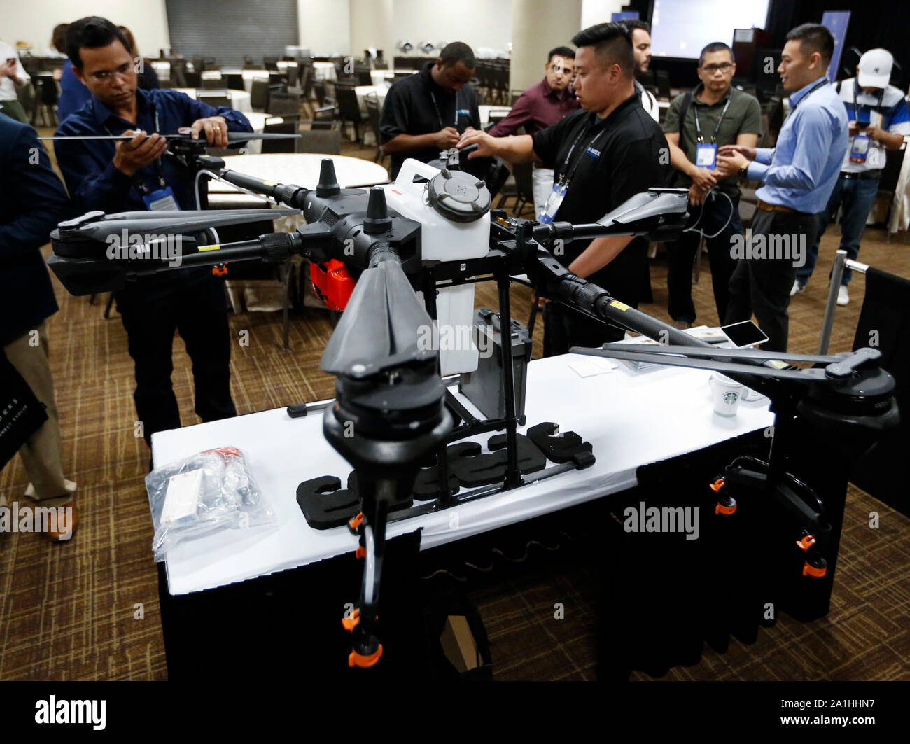 Los Angeles, USA. 24th Sep, 2019. Visitors view the DJI Agras T16 drone, a  spray drone for agriculture applications, during the annual AirWorks  conference in Los Angeles, the United States, Sept. 24,