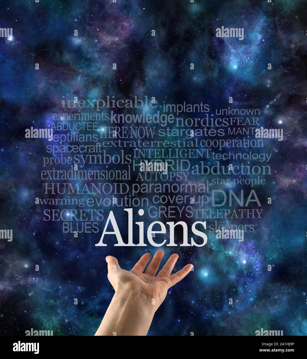 Are you Alien Aware Word Cloud - female hand with the word ALIENS floating above surrounded by a relevant word cloud against a cosmic dark blue night Stock Photo