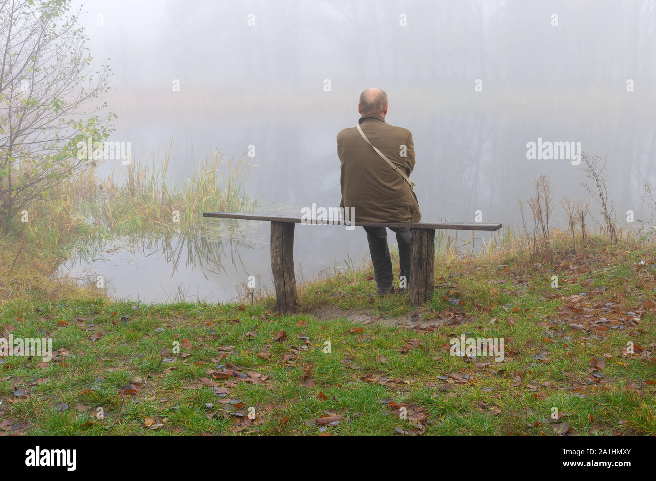 Lonely old man bench hi-res stock photography and images - Alamy