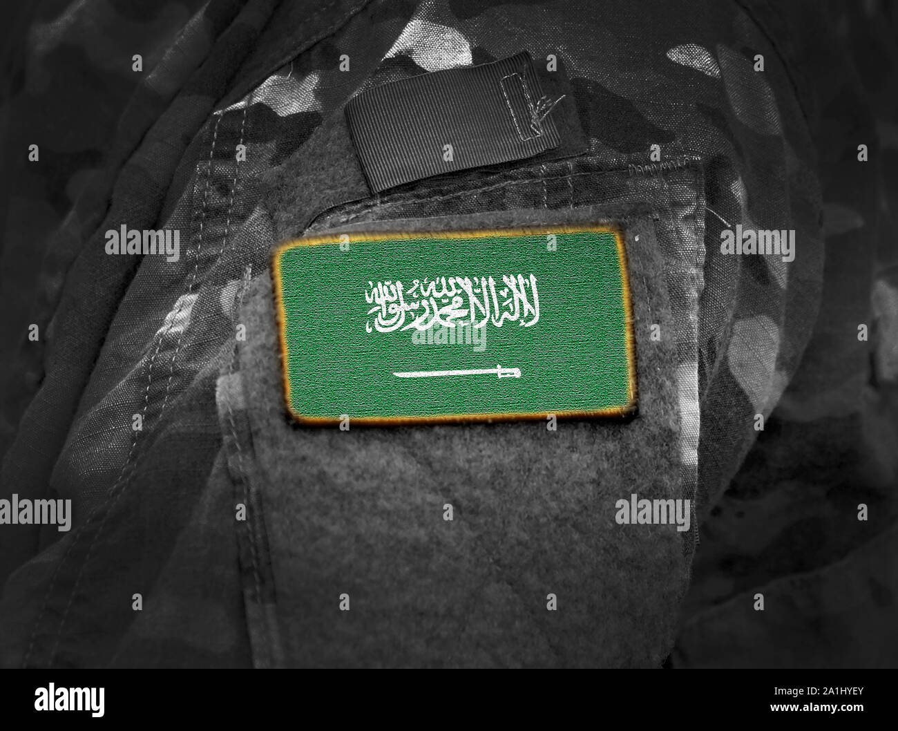 Flag of Saudi Arabia on military uniforms (collage). Stock Photo