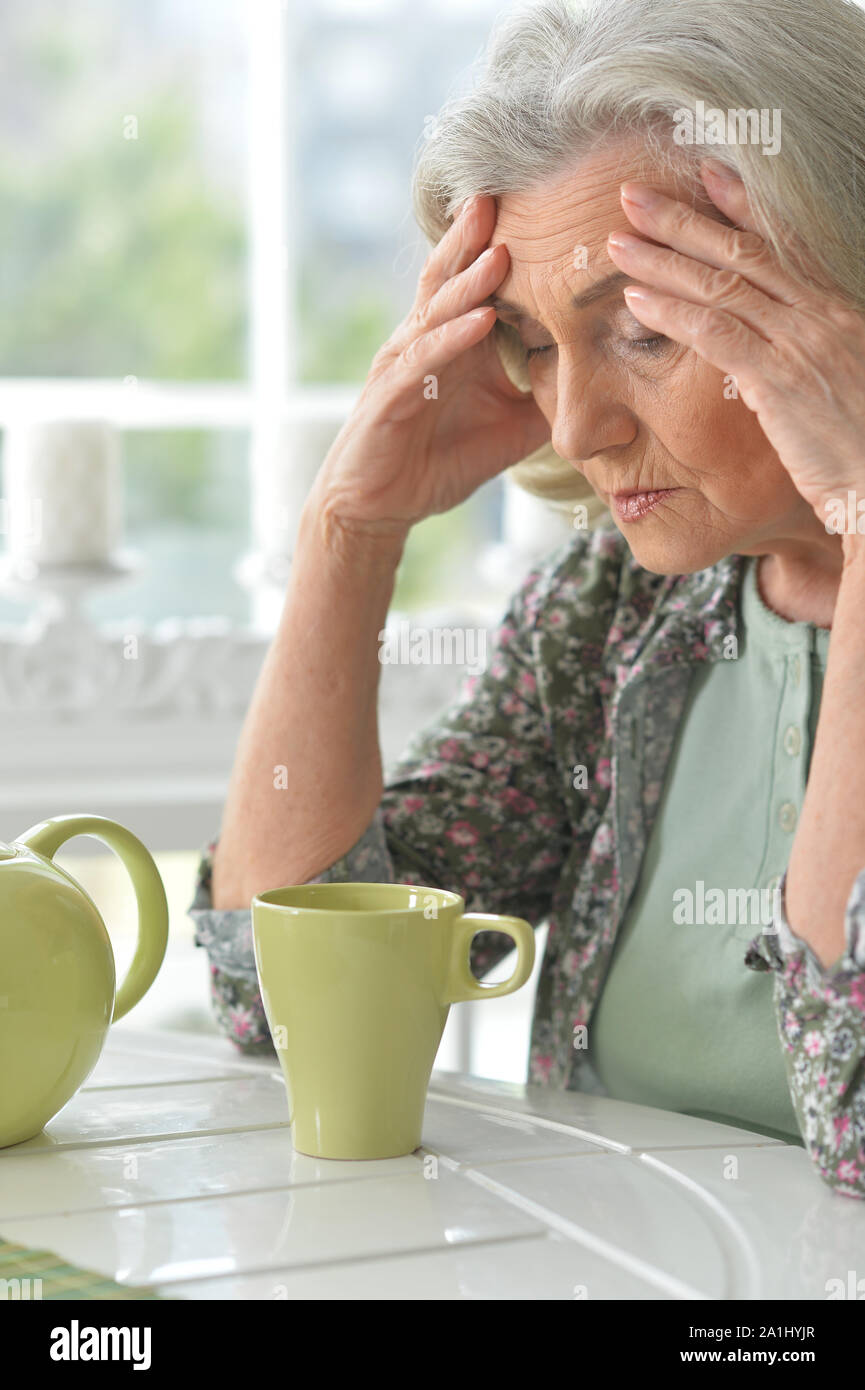 Woman and tea and sad face hi-res stock photography and images - Alamy