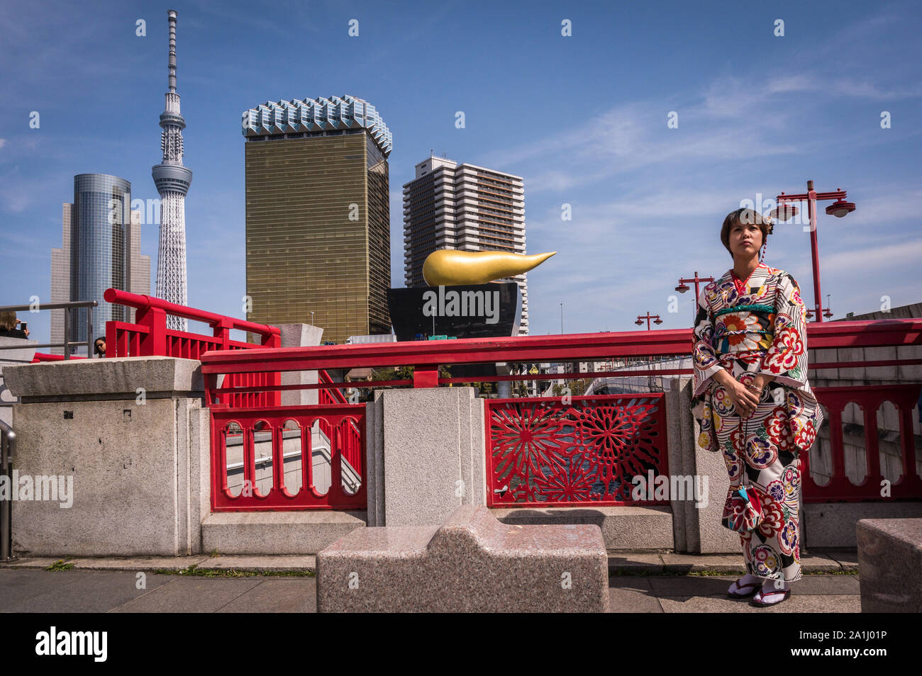 Woman in a kimono posing near Ueno Station, Tokyo, Japan Stock Photo