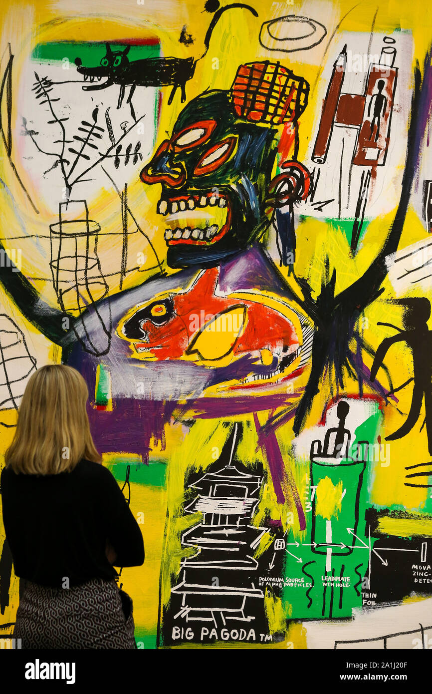 London Sotheby's, London, UK. 27 Sept 2019 - A staff member view Jean-Michel  Basquiat's artwork titled "Pyro" during the preview of SothebyÕs Frieze  Week Contemporary Art Sale. The auction will take place