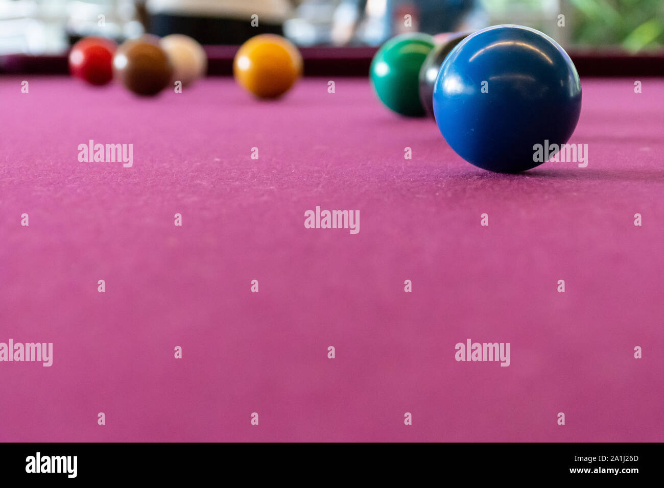 pink snooker table with colored balls Stock Photo