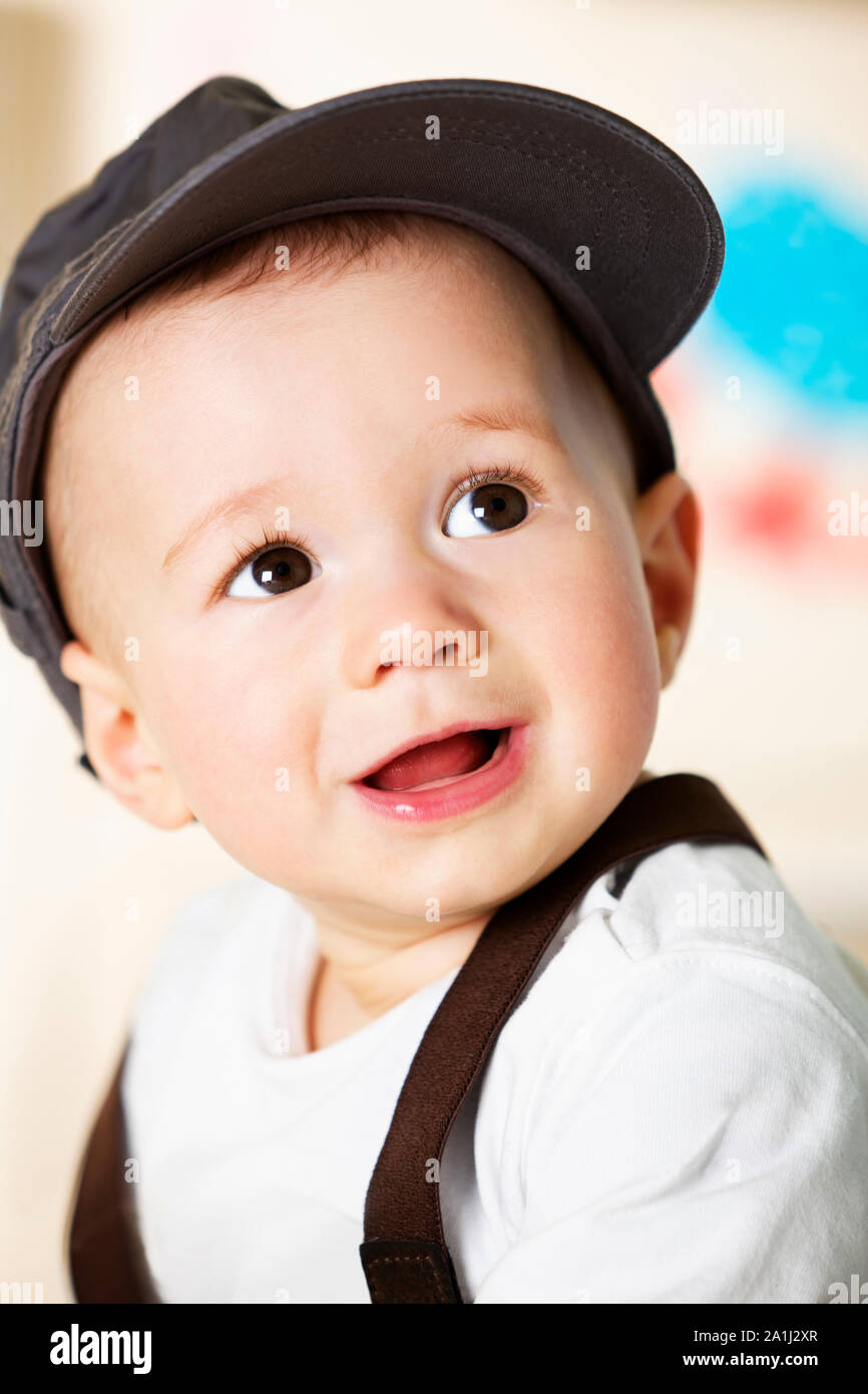 Baby boy portrait with cap Stock Photo - Alamy
