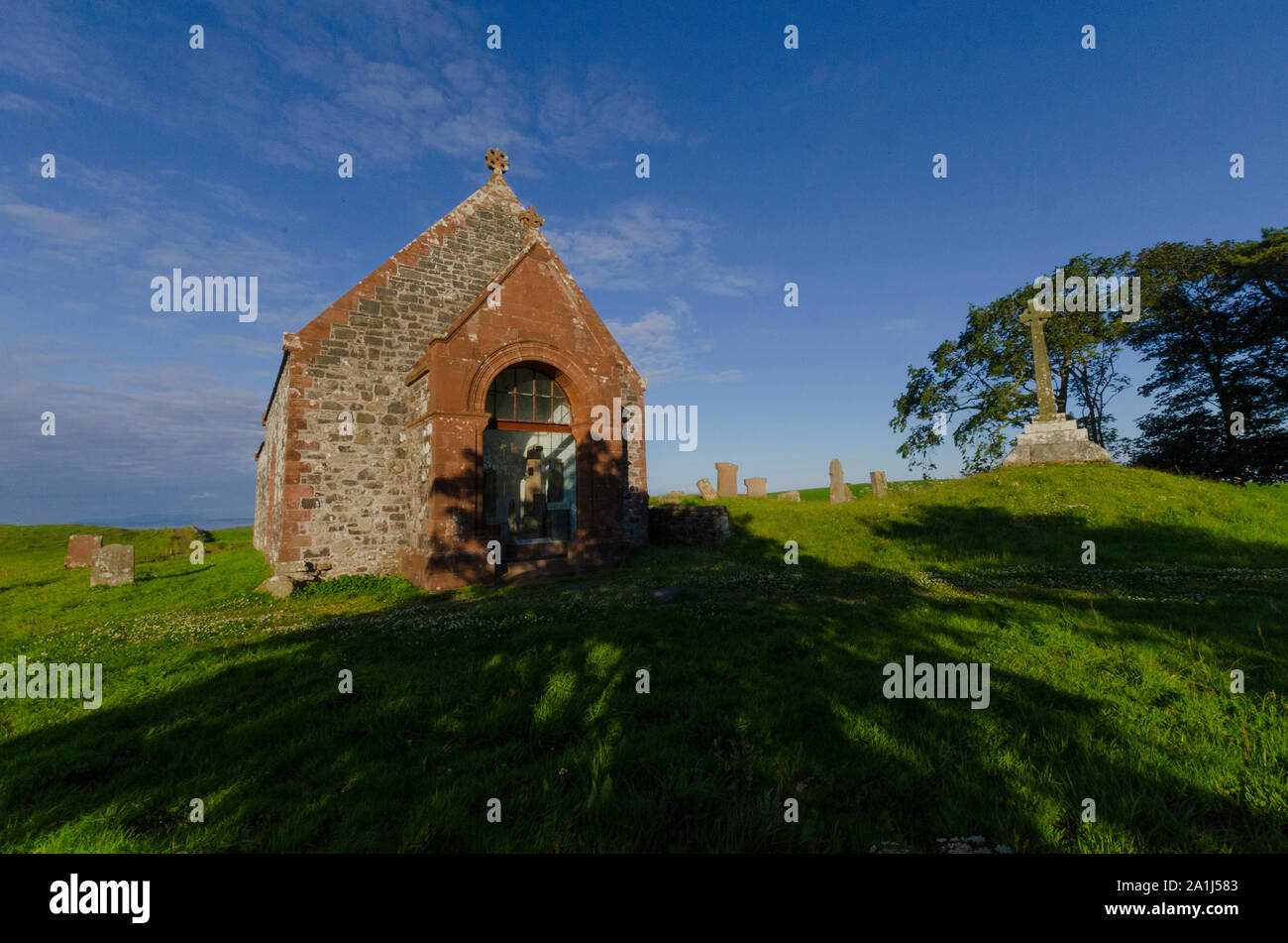 The Kirkmadrine Stones include three of the oldest Christian relics in Scotland reside in this burial chapel at Kirkmadrine Mull of Galloway Scotland Stock Photo